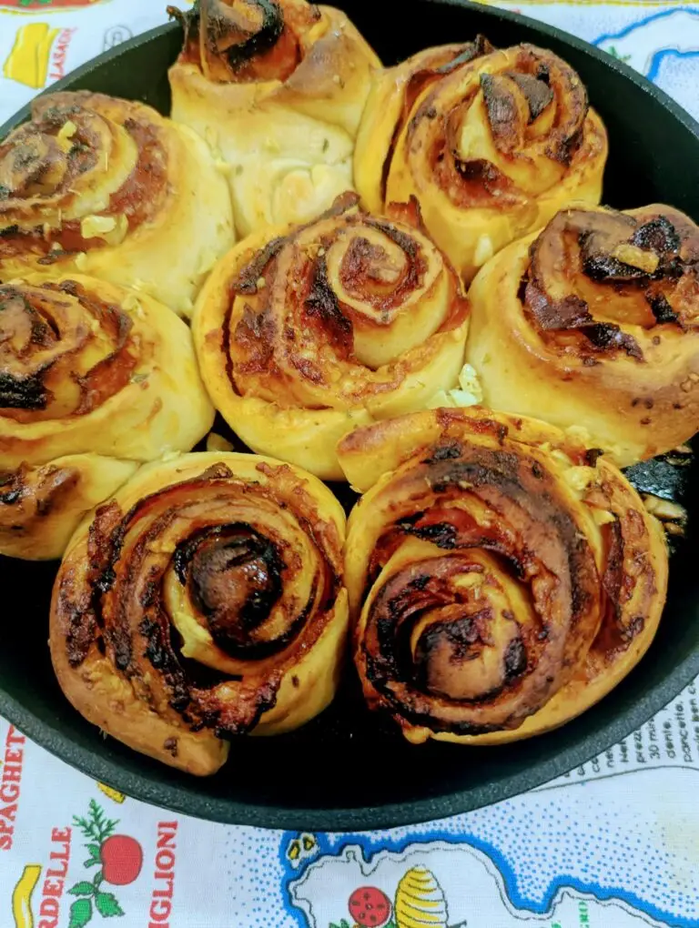 Golden brown rosette stromboli made with Birrittella's pizza dough, baked in a cast iron skillet and brushed with garlic herb butter.